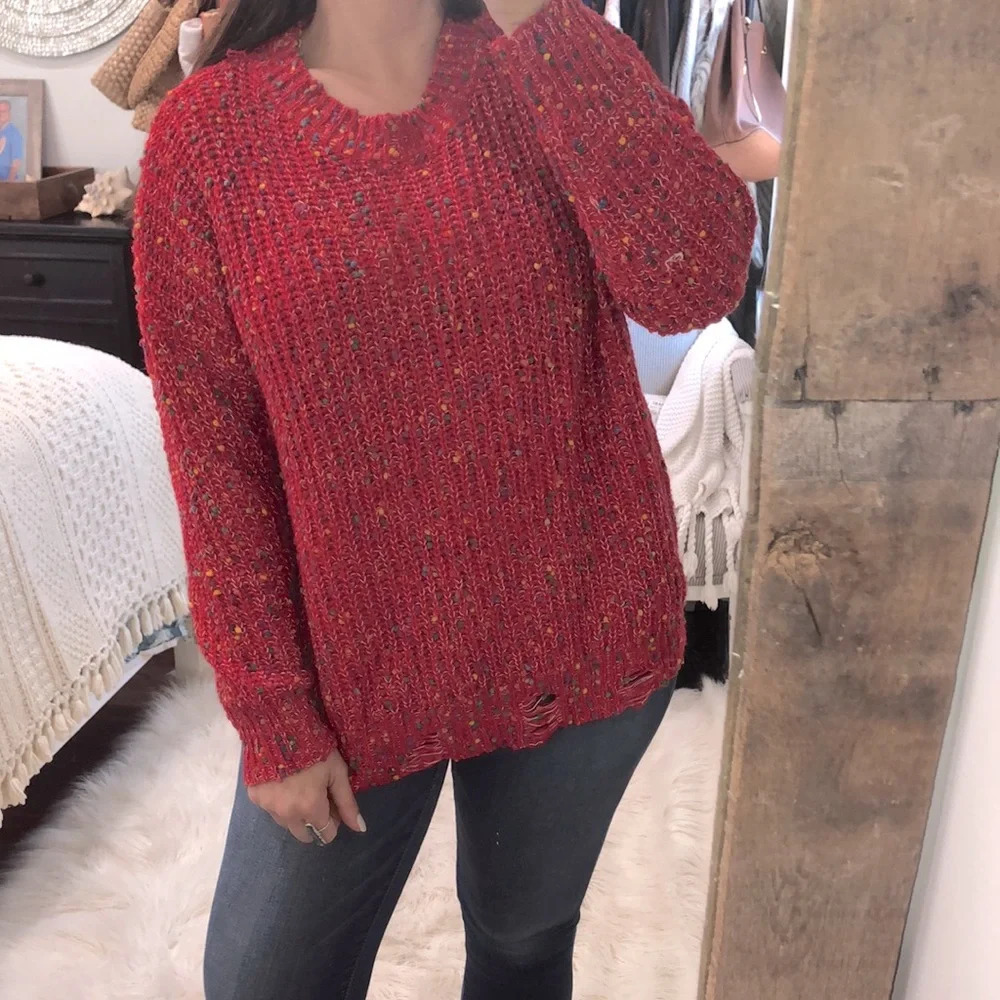 Main Strip size medium confetti Pom Pom distressed hem sweater